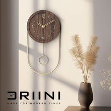 Load image into Gallery viewer, Driini Decorative Modern Wall Clock with Pendulum (Dark)