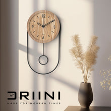 Load image into Gallery viewer, Driini Decorative Modern Wall Clock with Pendulum (Light)